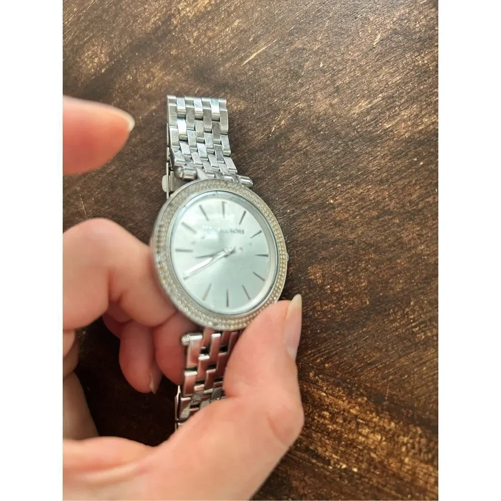 Michael Kors silver color faux diamond watch fits a small wrist 5 inches laying